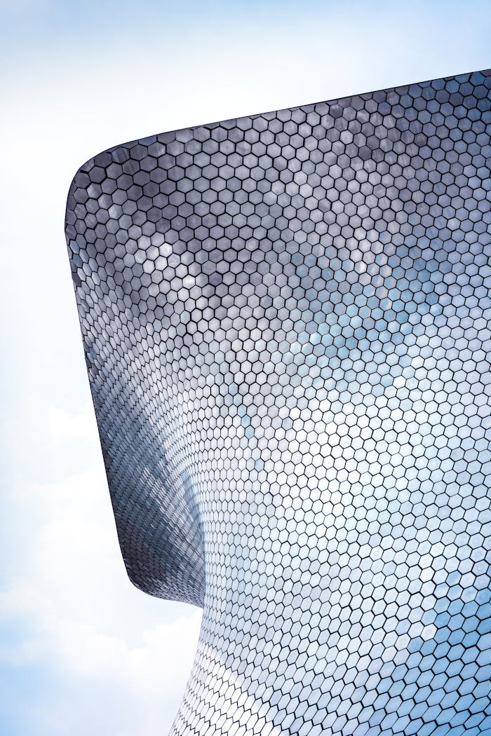 services-04 Modern architectural design, geometric facade of Soumaya Museum in Mexico City.